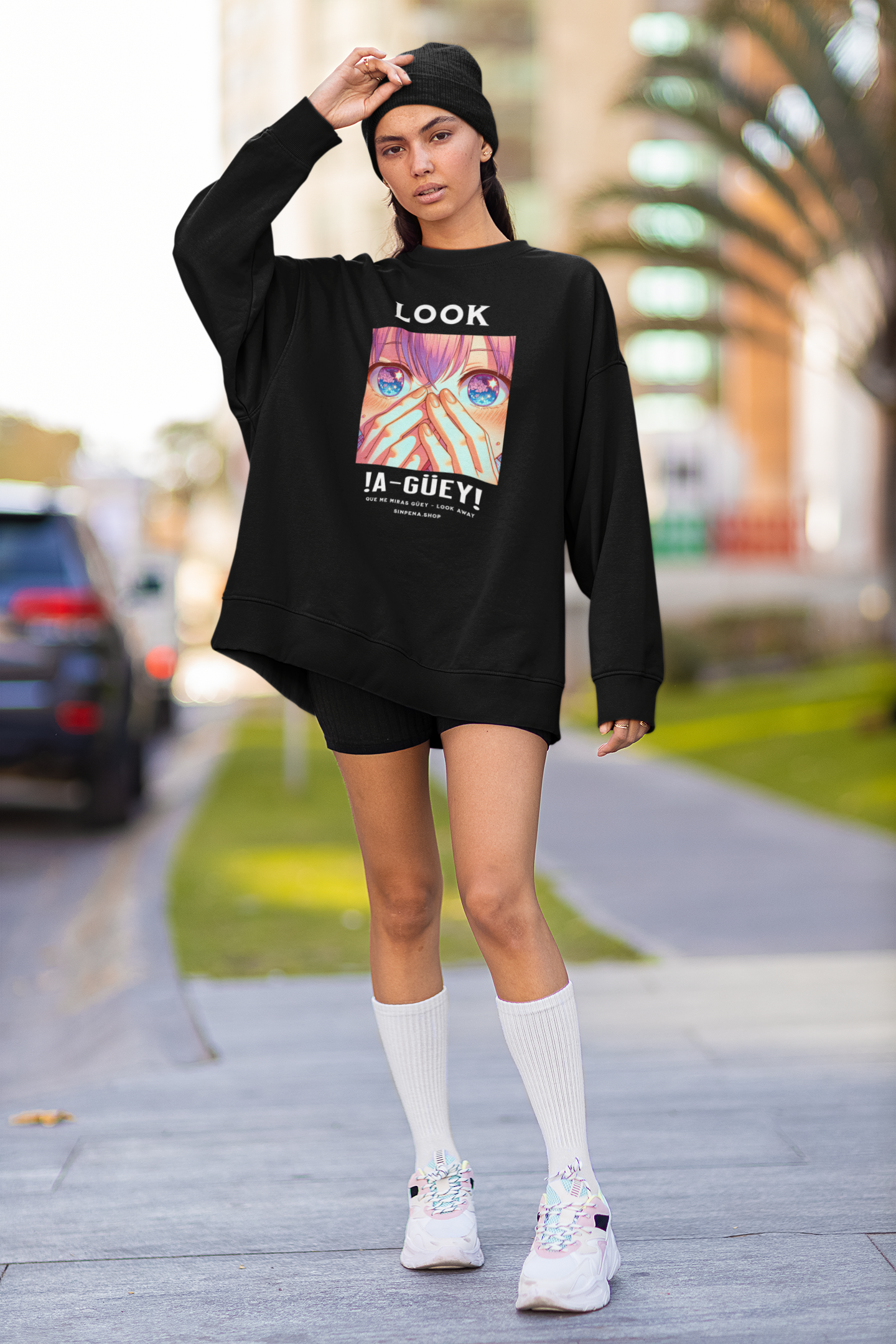 young-woman-wearing-an-oversized-sweatshirt-with-customizable-sleeves-and-a-beanie